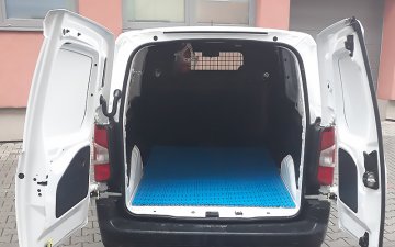 Plastic floor in the cargo compartment of the van
